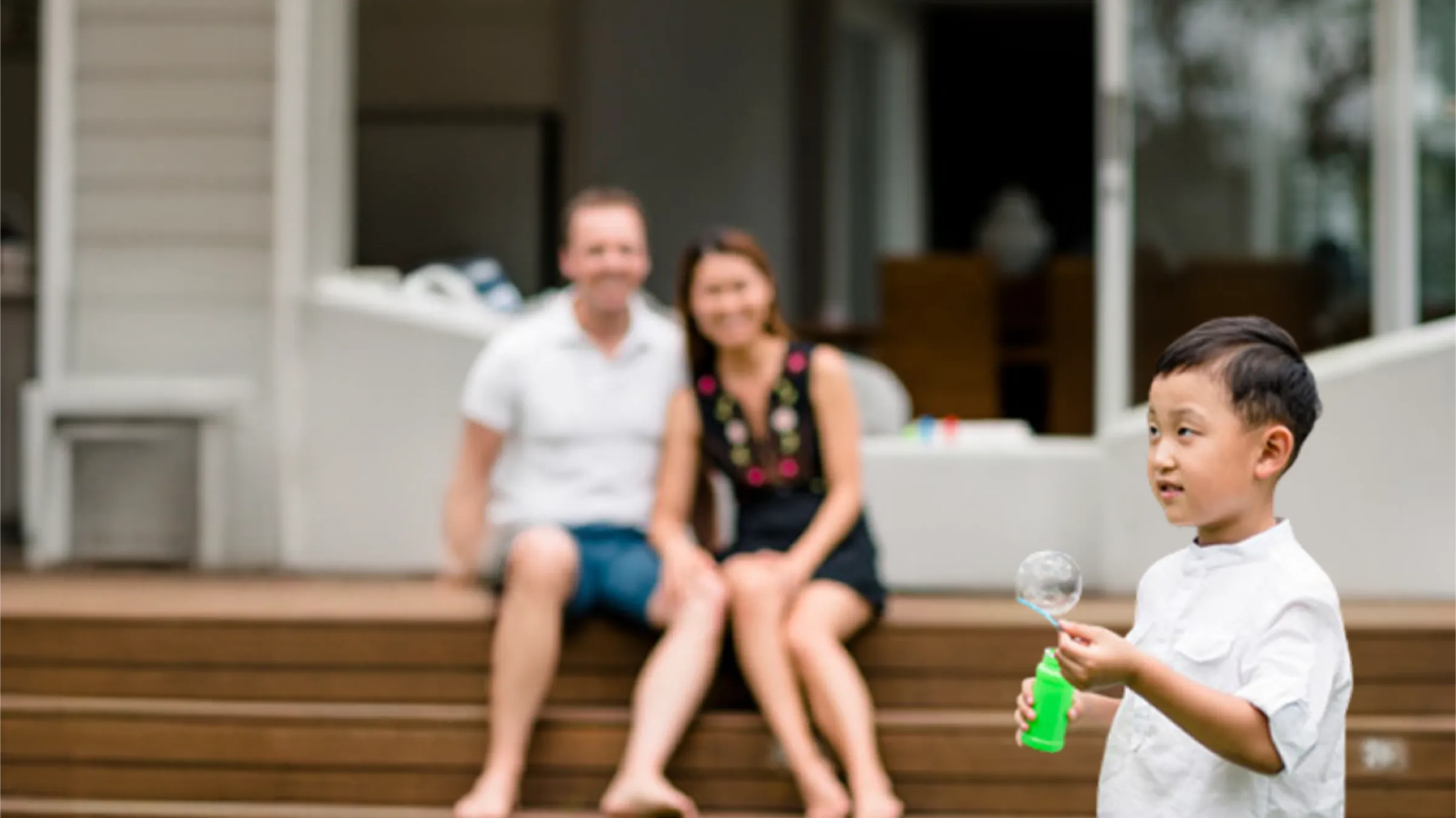 Children blowing bubbles